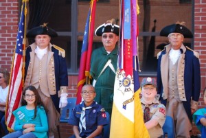 Sons of the American Revolution with students Allison Kading, Phillip Head, and Ryan Doyle